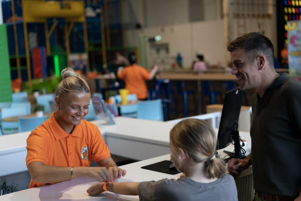 Father and daughter check-in at Climb Up Doncaster
